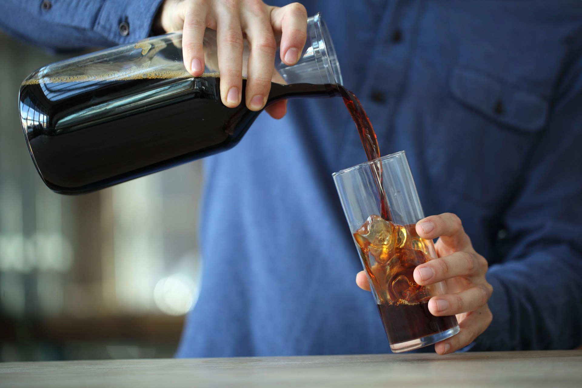 barista making iced coffee, kenwood, california, usa