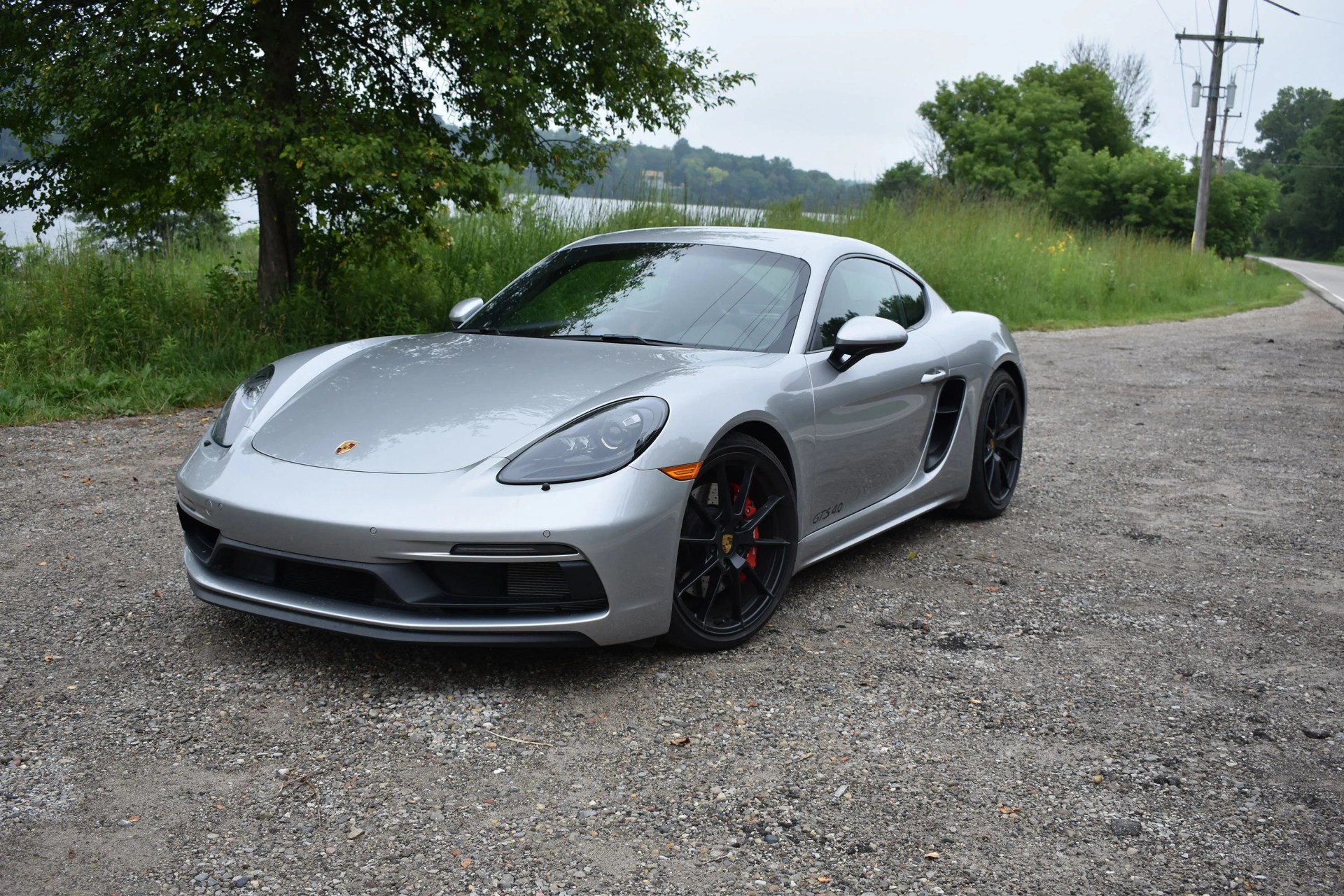 silver porsche cayman gts 4