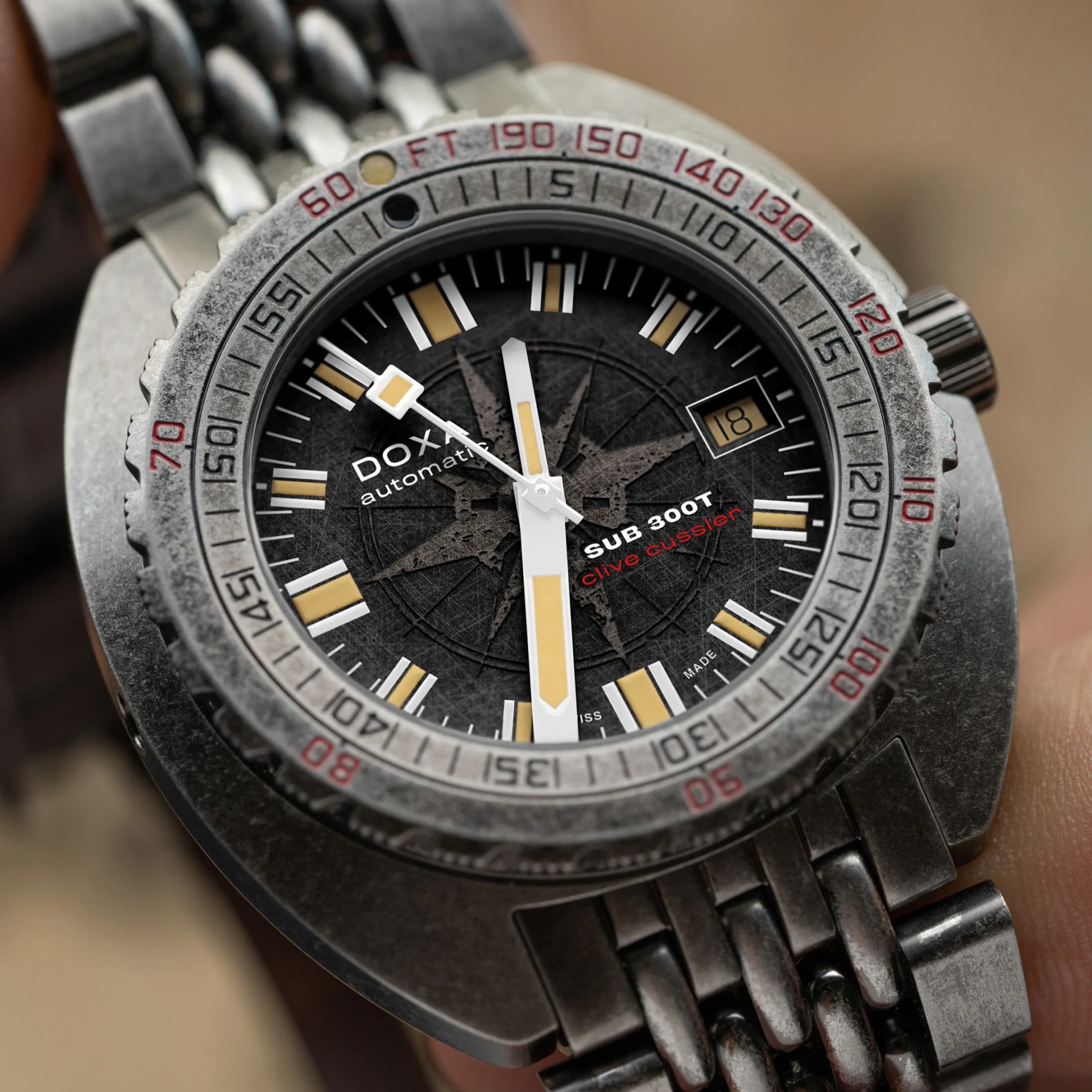 a weathered doxa dive watch