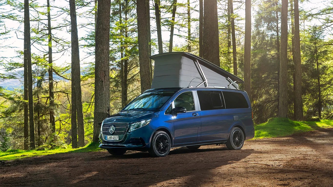 mercedes camper van in the woods