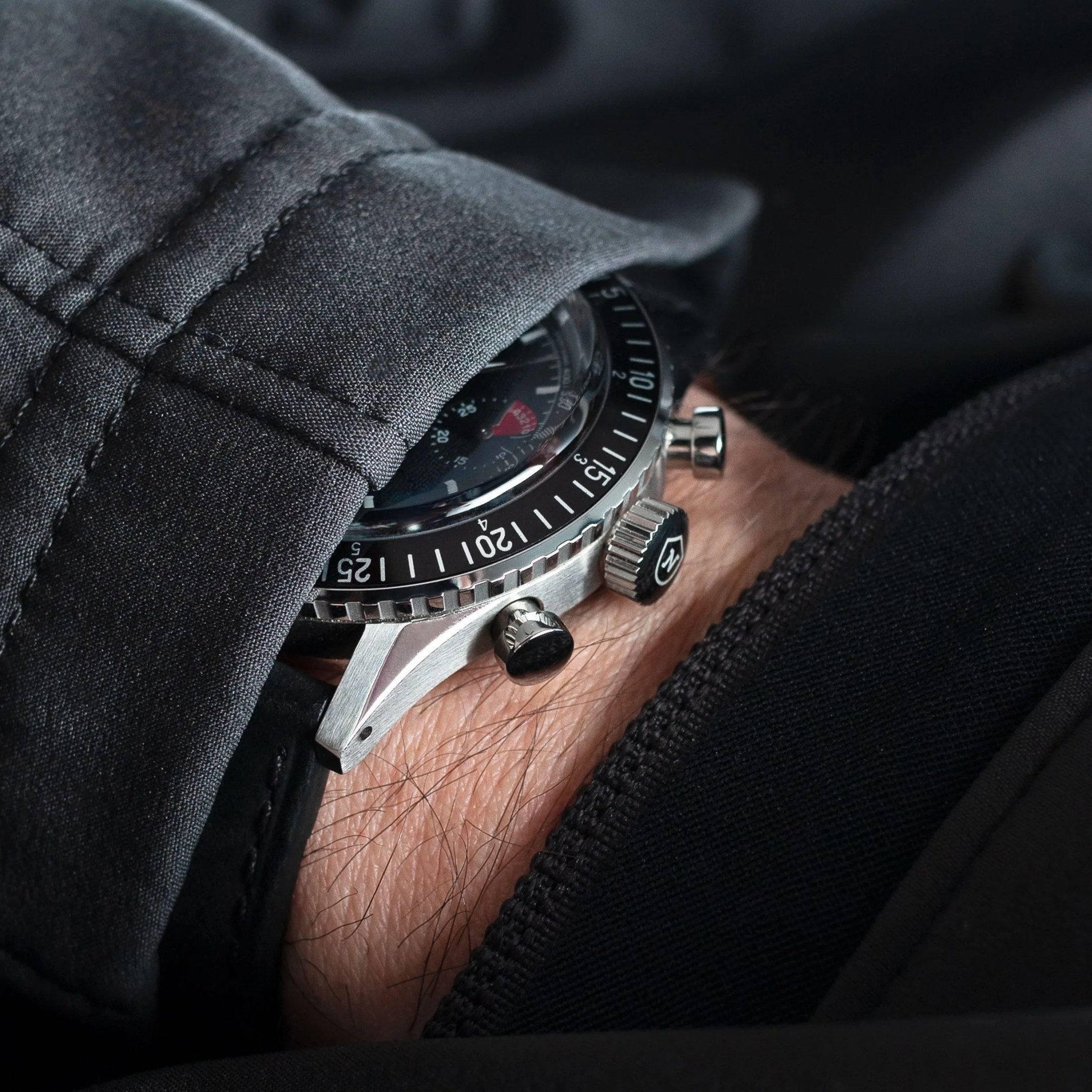 chronograph watch under cuff