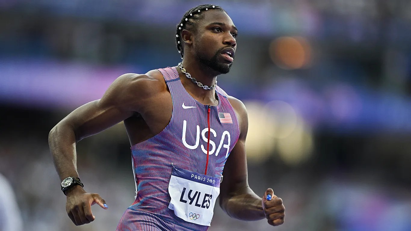 sprinter noah lyles wears an omega speedmaster watch while competing