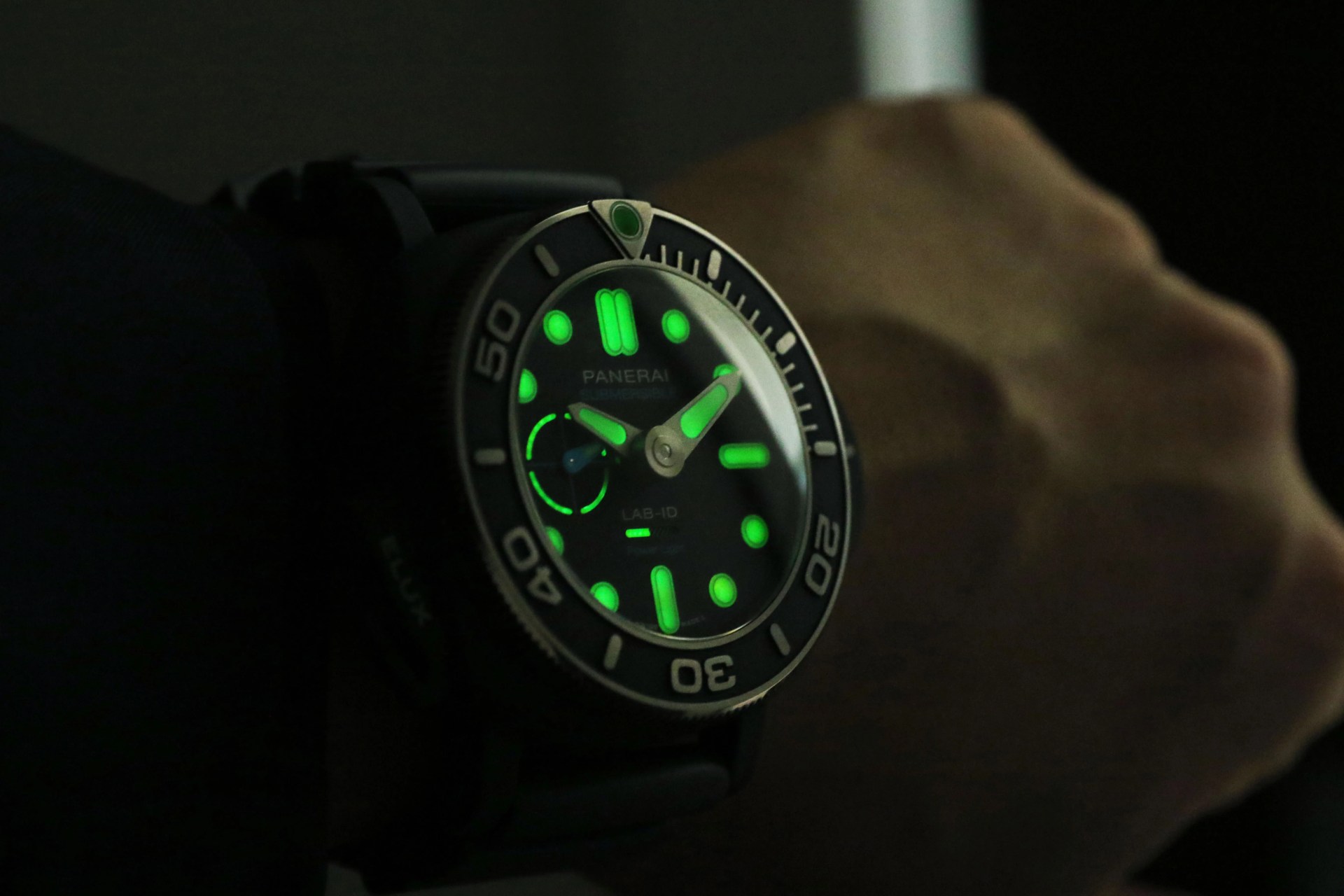 glowing panerai on wrist