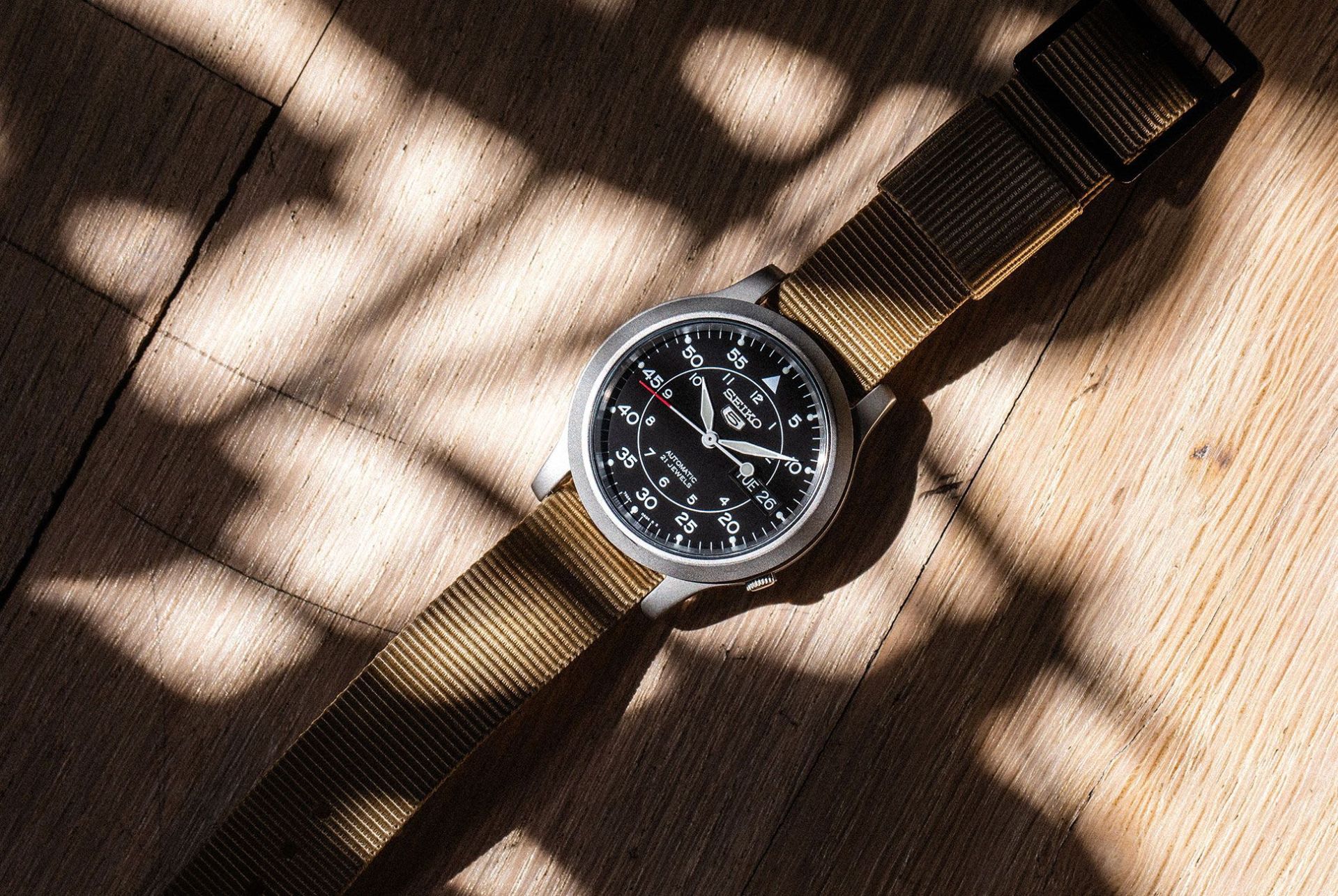 seiko snk field watch with plant shadows