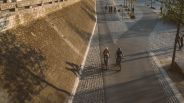 two people riding e bikes