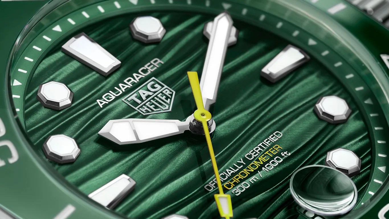 closeup of green tag heuer watch dial