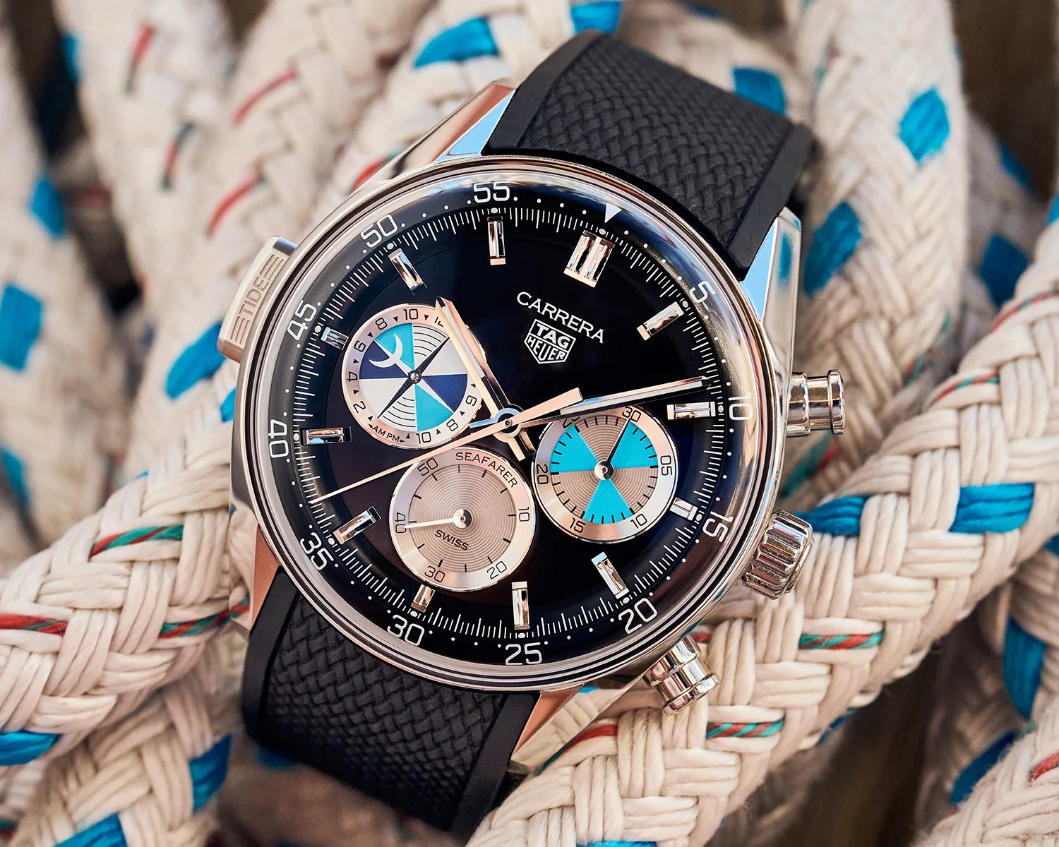 tag heuer watch on a pile of ropes