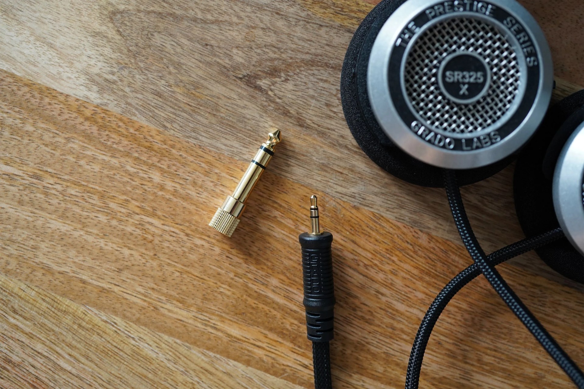 wired headphones on a desk